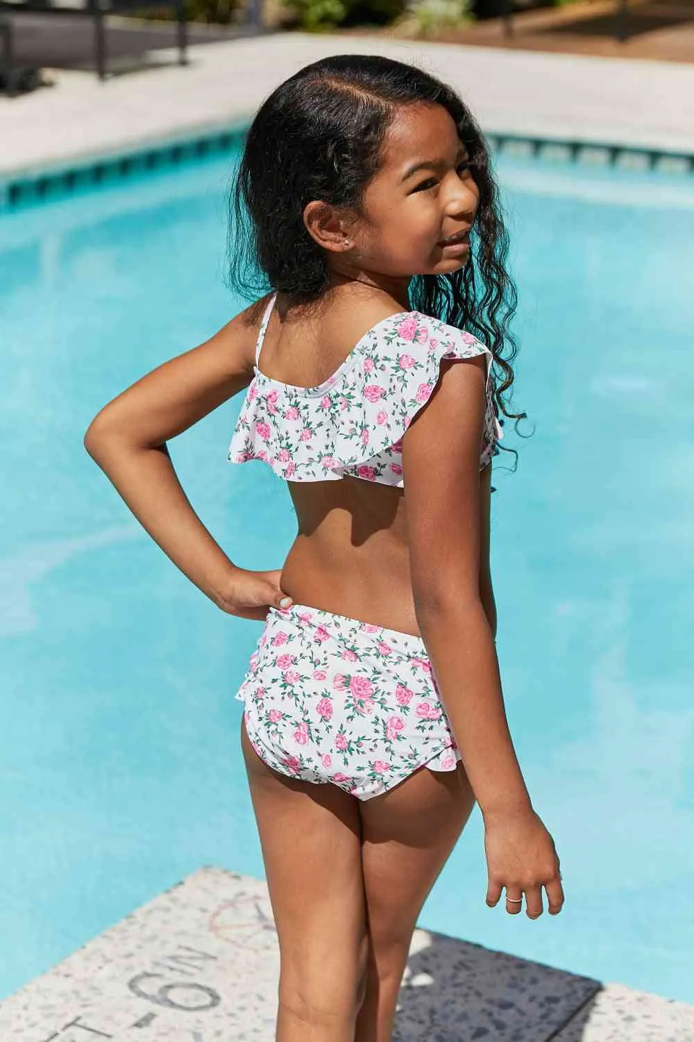 Float On Ruffle Two-Piece Girls Swim Set in Roses Off-White